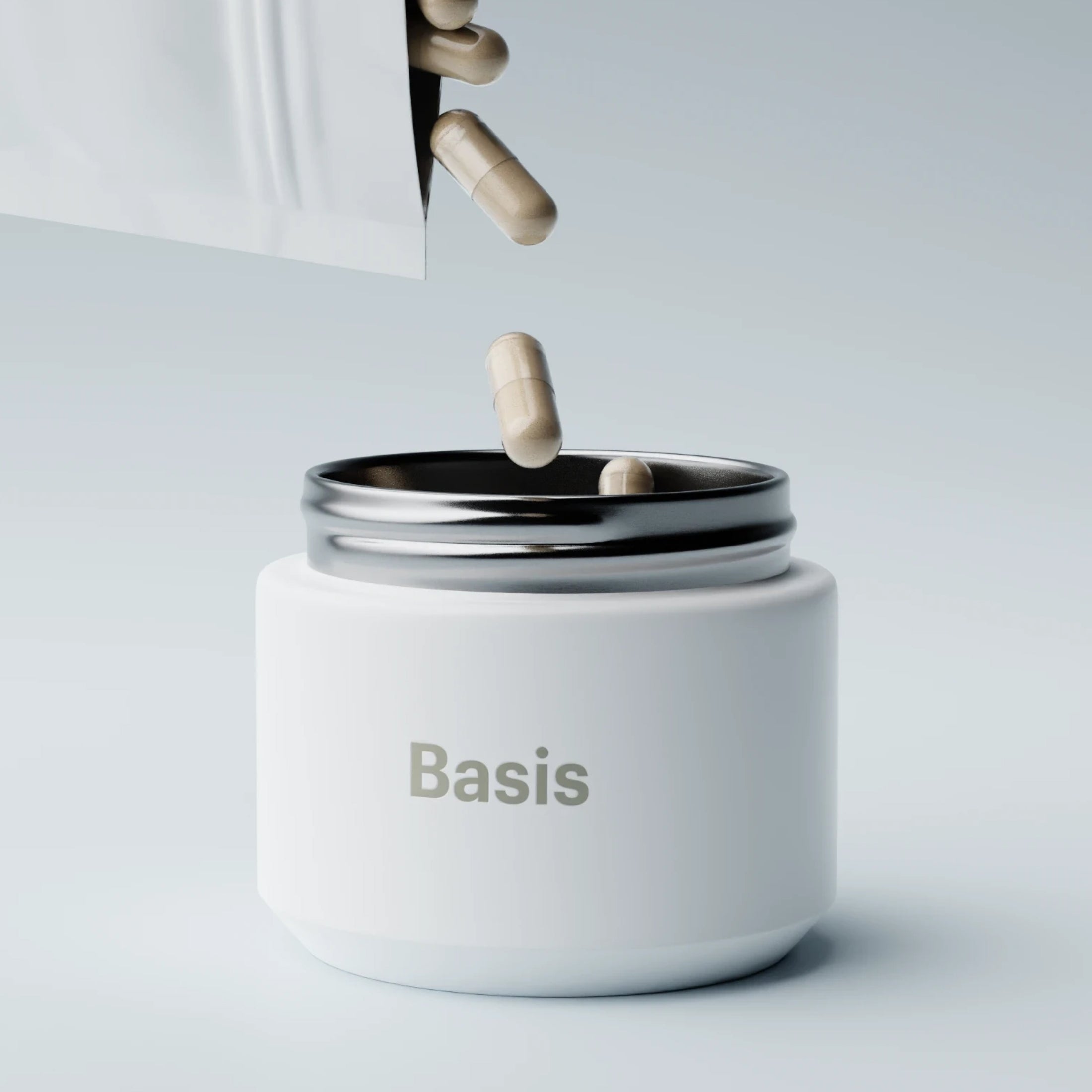 Basis capsules being poured into the white Basis bottle